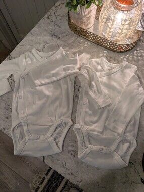 Brand New White Baby Body Suits